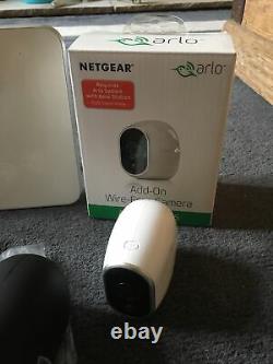 ARLO base Station. Pro 2 Camera With Batteries And Battery Charger, Mount & Skin
