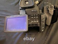 Canon C100 Camcorder + Charger & Three Batteries