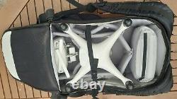 DJI Phantom 4 Pro, spare batteries, chargers, spare props, carrying rucksack