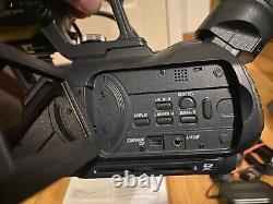 Great Gift JVC GY-HM150 Pro HD Camcorder with XLR Shotgun Mic, Battery, Charger