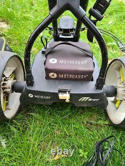 Motocaddy M1 Pro Electric Golf Trolley with battery, charger and travel bag