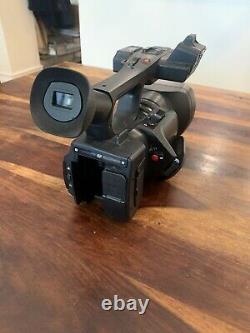 Panasonic AG-AC90 Camcorder with 2 batteries, charger, and remote